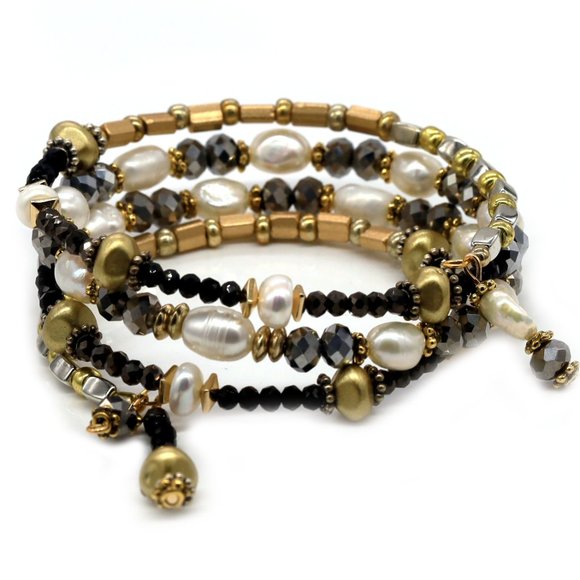 By Bead Emporium Jewelry - Memory wire bracelet with gold and black beads with silver accents.